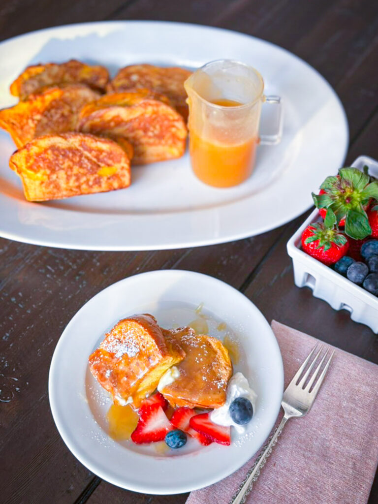 Brioche French toast with buttermilk syrup and fresh berries