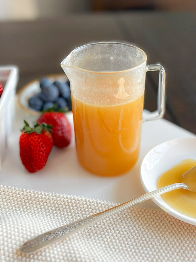 easy homemade buttermilk syrup in glass pitcher for pancakes or French toast